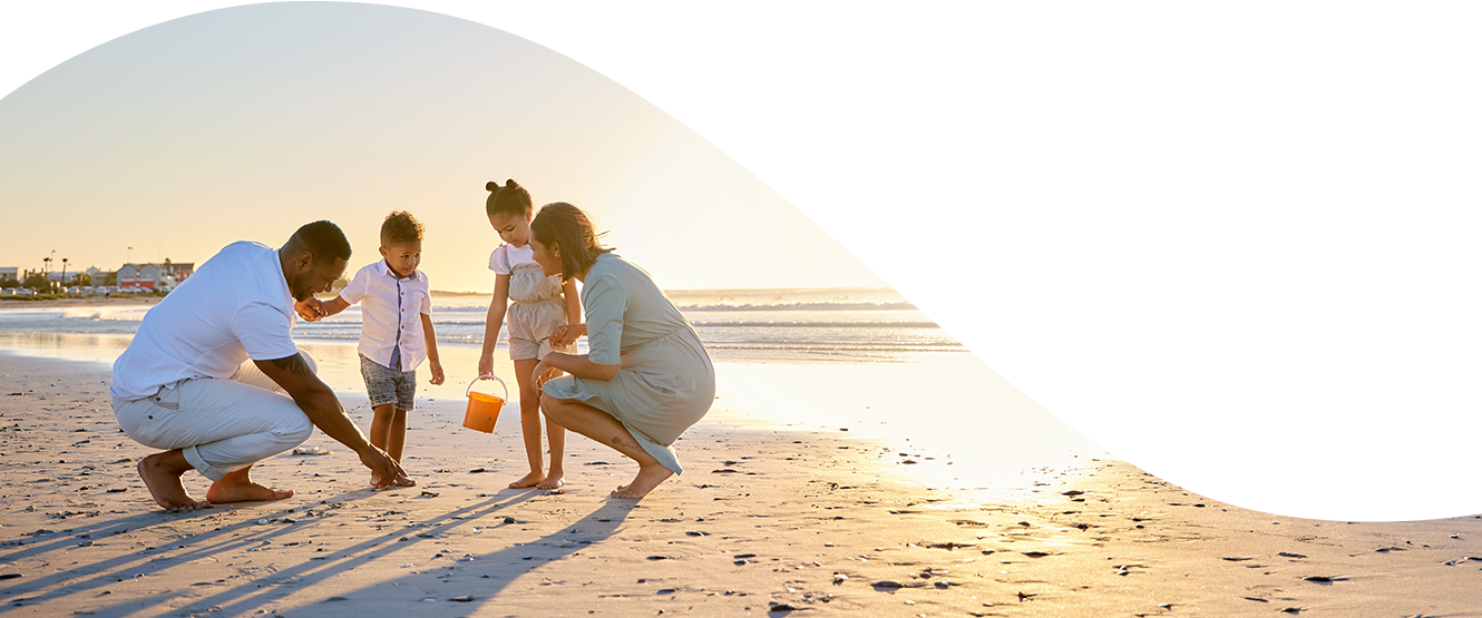 Banner image of family on beach